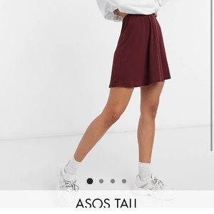 ASOS DESIGN Tall flippy mini skirt in rib in wine
